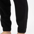 Reebok Pantalon de Jogging en Polaire Noir Homme