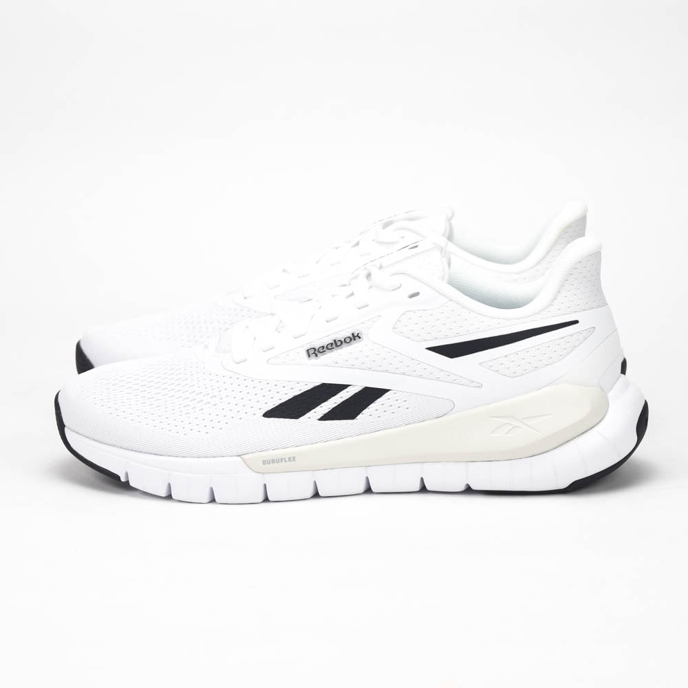 Reebok Flex Trainer Baskets de Sport Confortables Homme