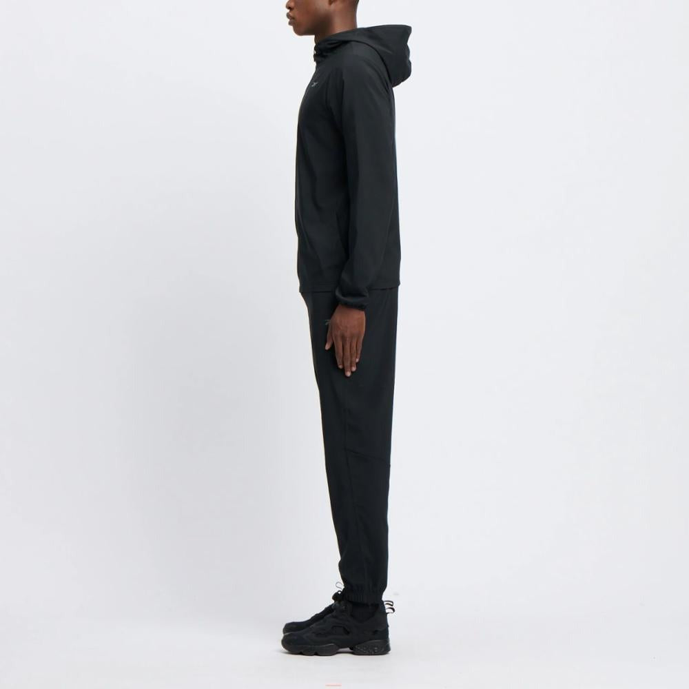 Reebok Veste Coupe-vent Légère et Respirante Homme