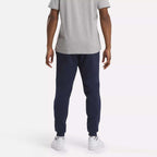 Reebok Pantalon de Jogging Confortable Homme