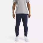 Reebok Pantalon de Jogging Confortable Homme