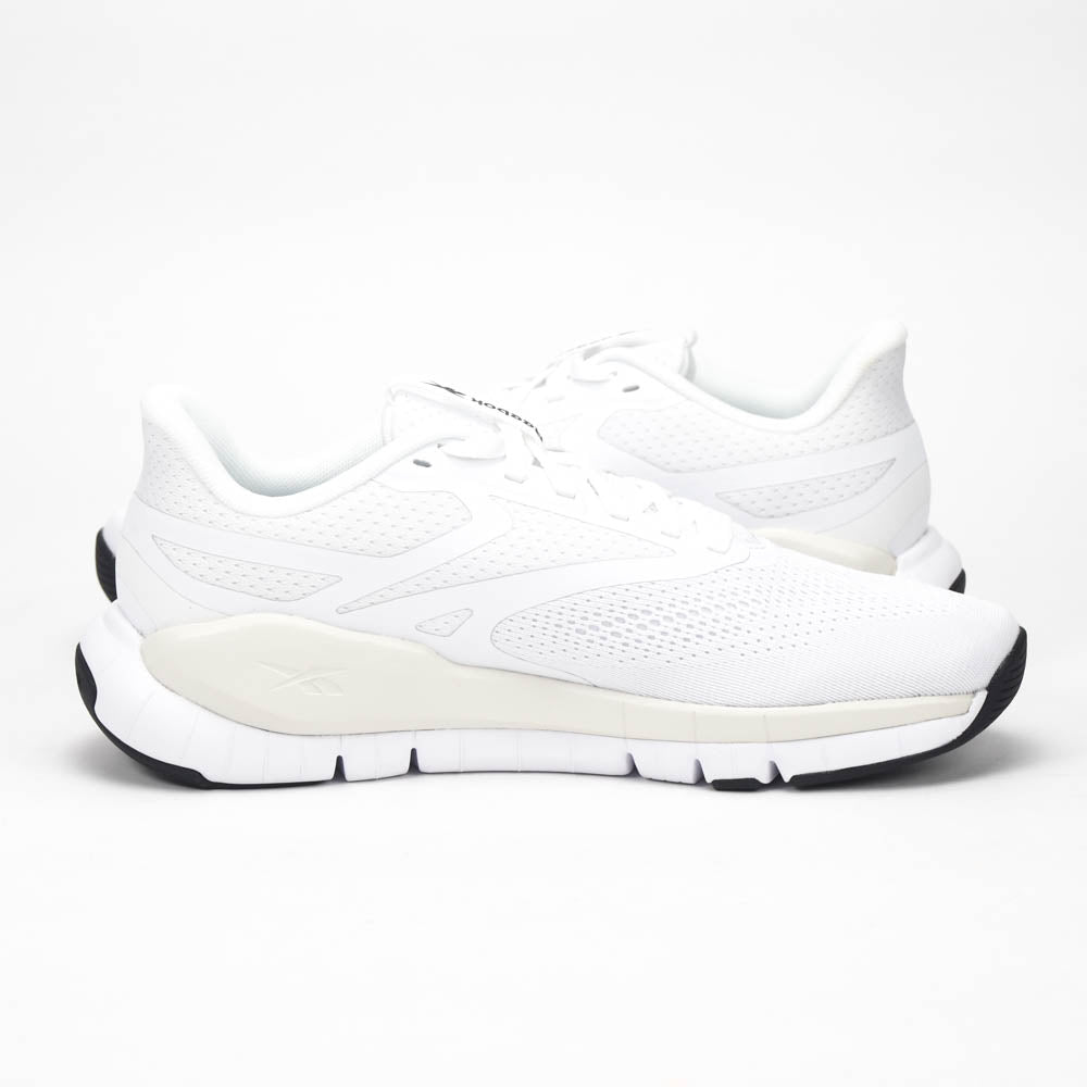 Reebok Flex Trainer Baskets de Sport Confortables Homme
