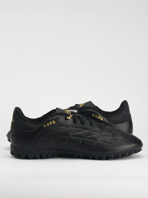 Black soccer cleats with 'Copa' branding on a white background